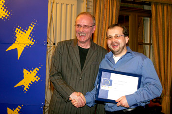 Ivanes receiving award