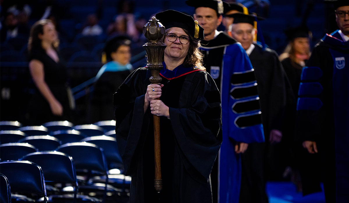 Faculty senate leading faculty during commencement