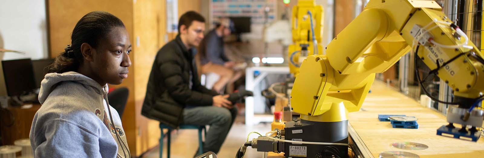 The advanced robotics class is programming some of the robots in the lab