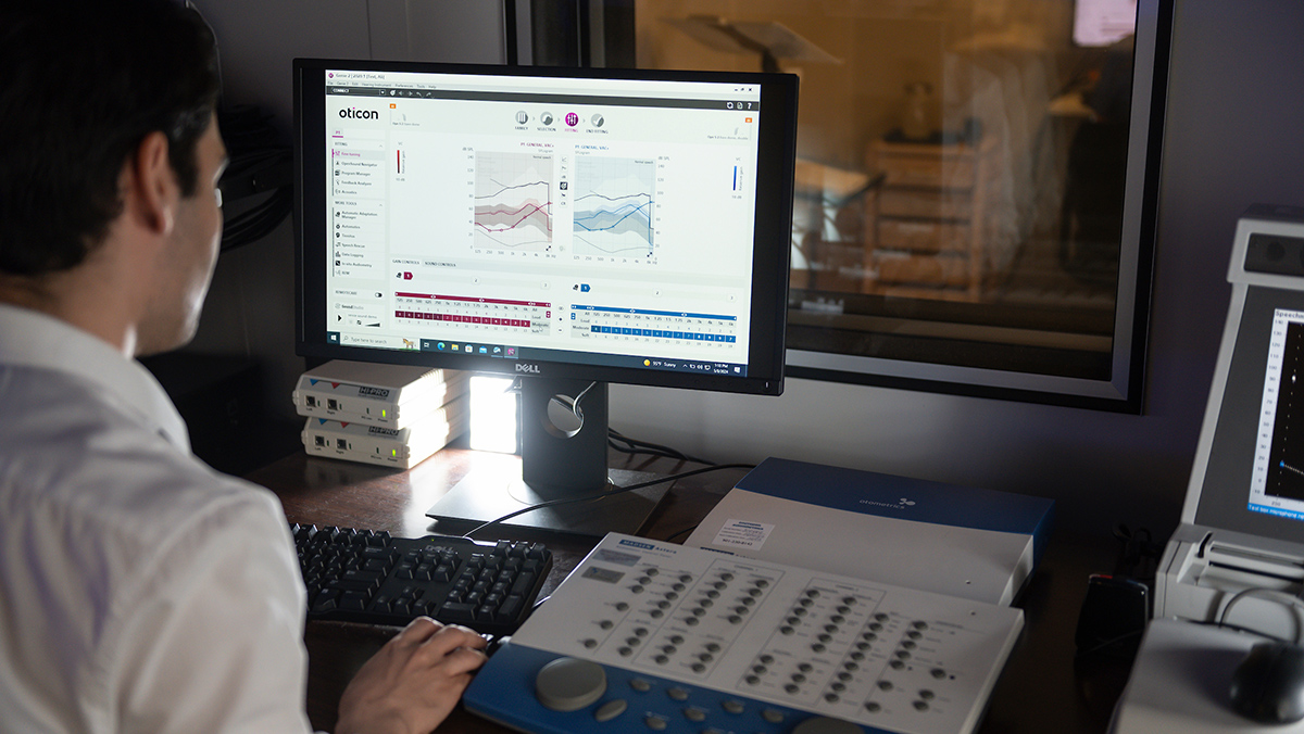 Graduate data statistics students looking at data visualizations