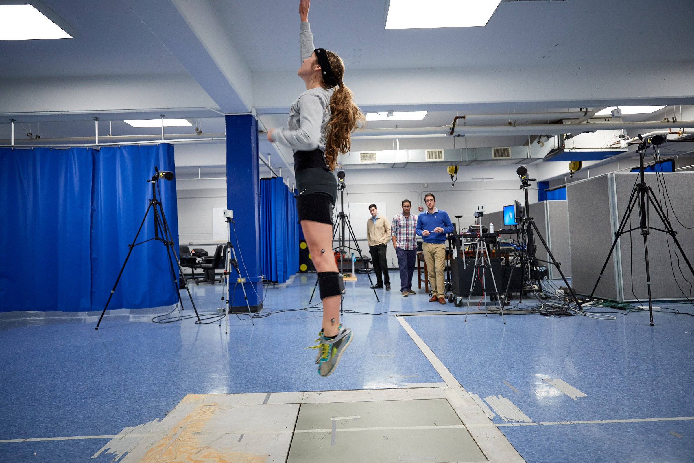 female student jumping for data test
