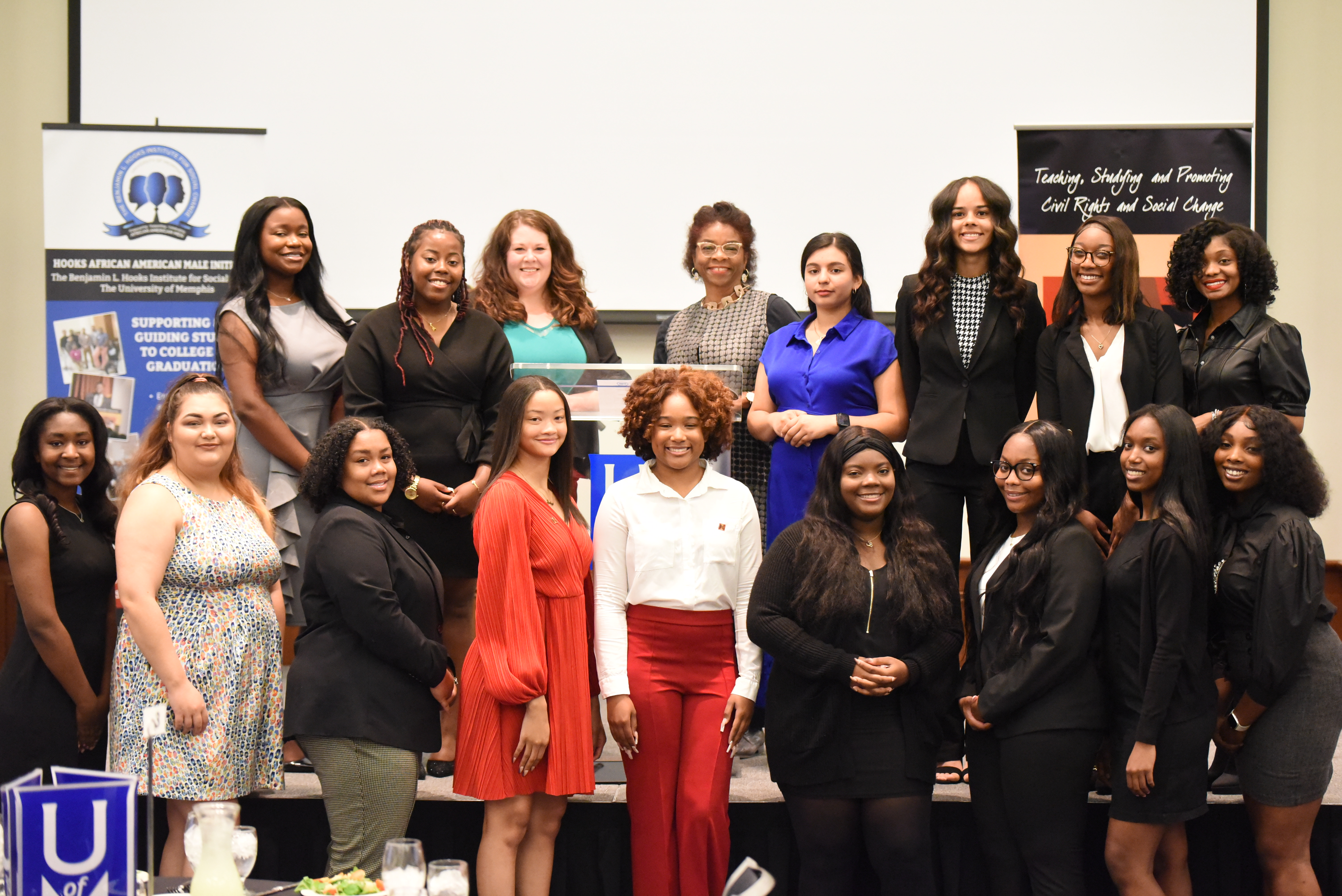 A diverse group of women in the A Seat at the Table program.