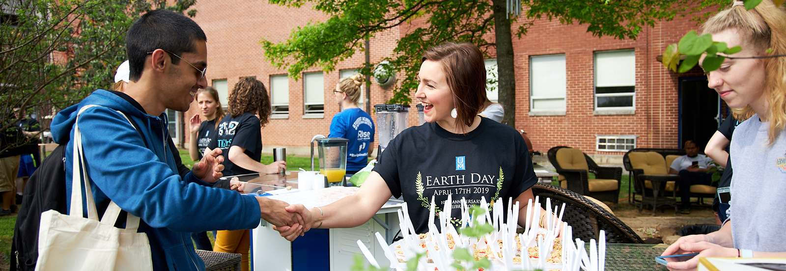 student and volunteer at Earth Day