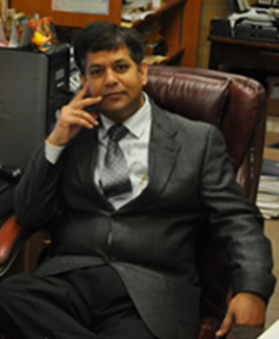 Dr. Mishra in his office