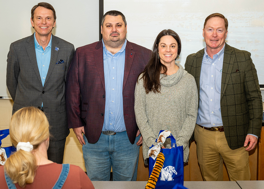 UofM President Bill Hardgrave, Dr. Shawn Brown, Dr. Jennifer Mandel and DU CEO Adam Putnam pose for a photo