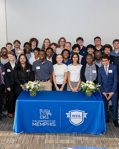 Weil Scholars students, faculty and staff gather for a group photo.