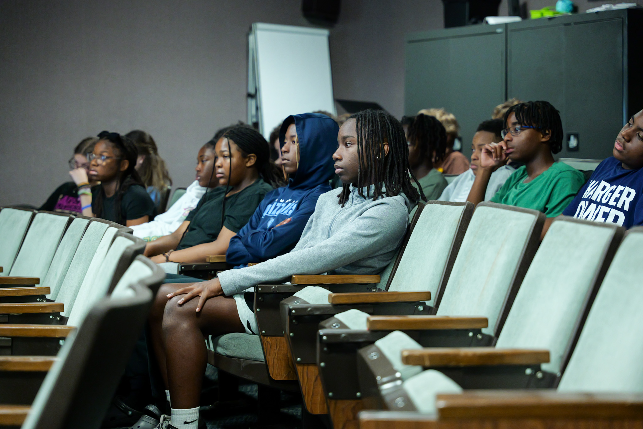 Campus Middle School Students listen to dissertation defense from Dr. Ashely Boles