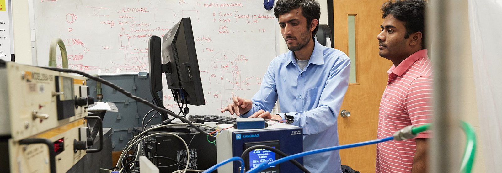 student with laser equipment