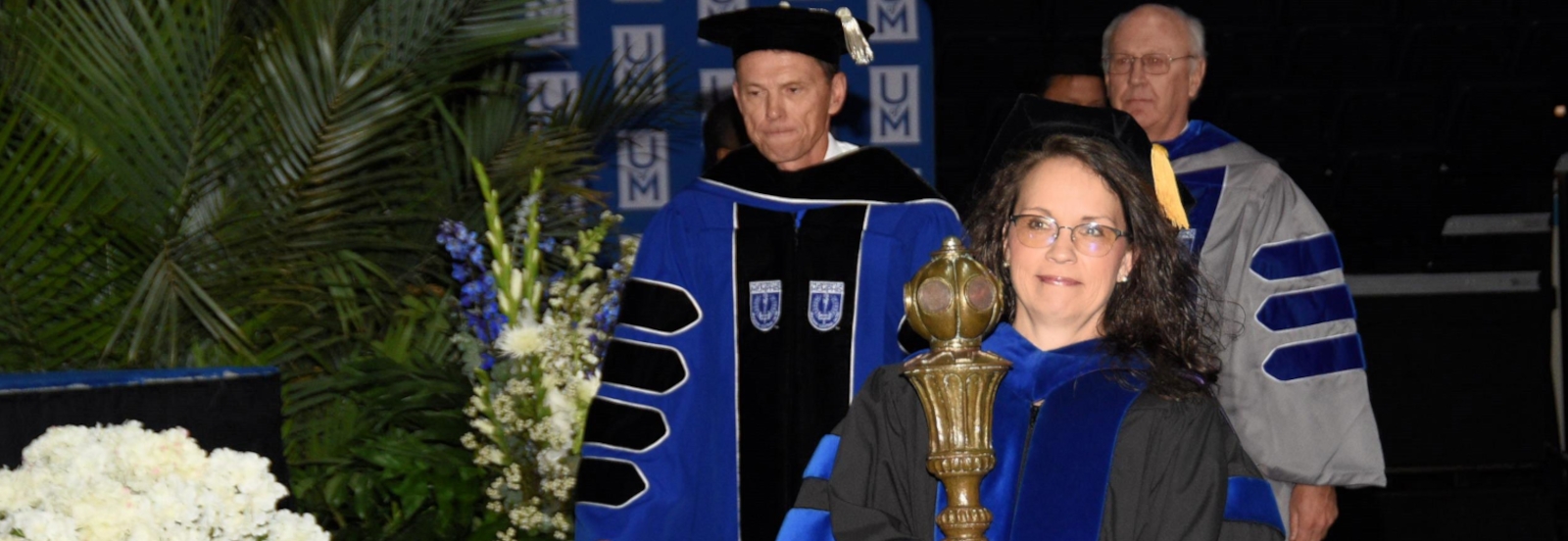 Faculty Senate President with Mace at Commencement