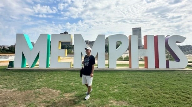 Frans Samosir in front of Memphis sign