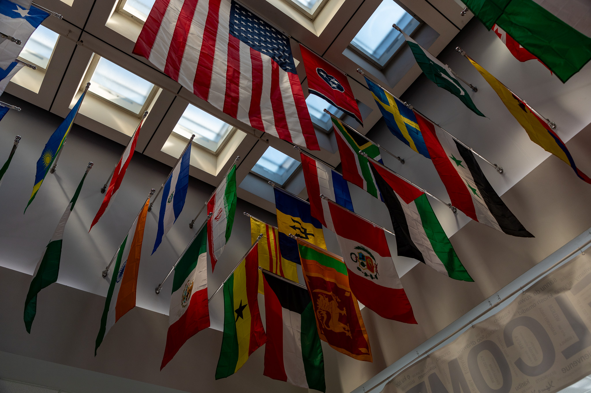 flags displayed in the Herff Administration building