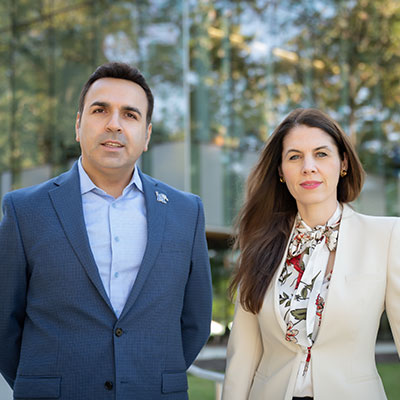 Dr. Maryam Karimi, associate professor in the School of Public Health (right), and Dr. Rouzbeh Nazari, chair and professor in the Department of Civil Engineering