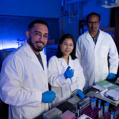 Dr. Xiaohua Huang and colleagues in the lab