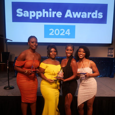 UofM students pose with their Sapphire Awards