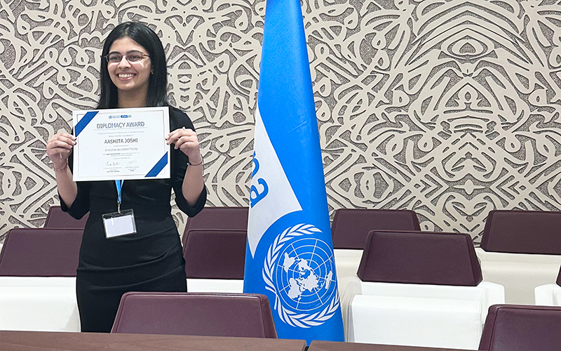 Aashita Joshi receiving award in Conference at Global Model WHO 2024, Geneva