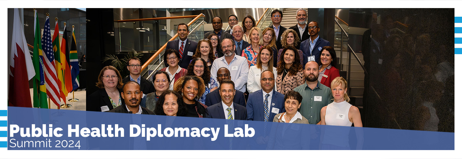 Public Health Diplomacy Summit 2024 - Group Photo with many international flags