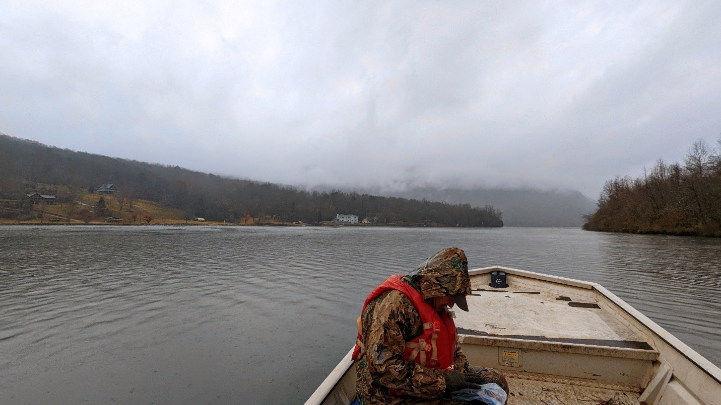 A view from the Tennessee River shows a landslide constricting the river channel to its most narrow point in the gorge.