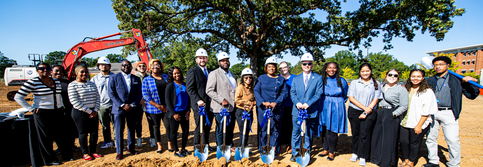 Residents staff gather for groundbreaking ceremony