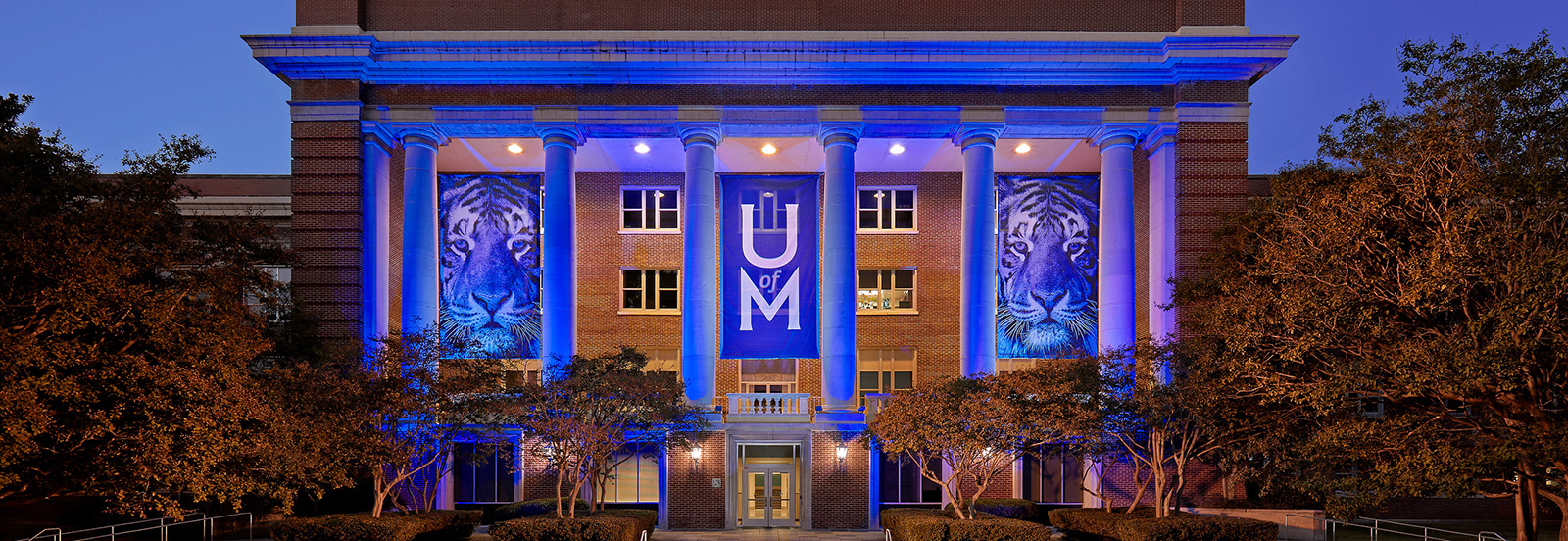 Picture of Administration Building at Night with blue lights