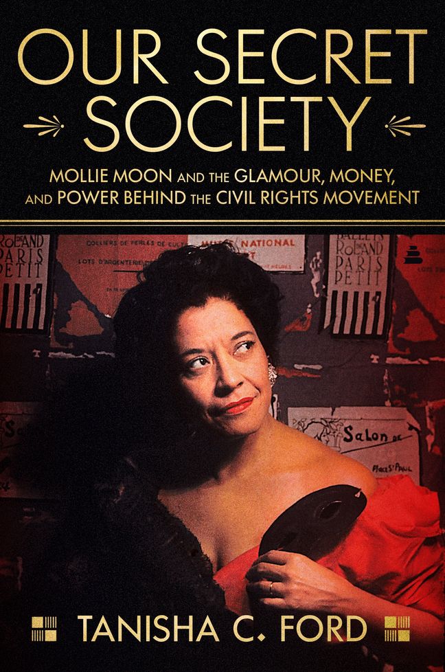 Socialite Mollie Moon, an African American woman, poses in a strapless black and red evening gown.