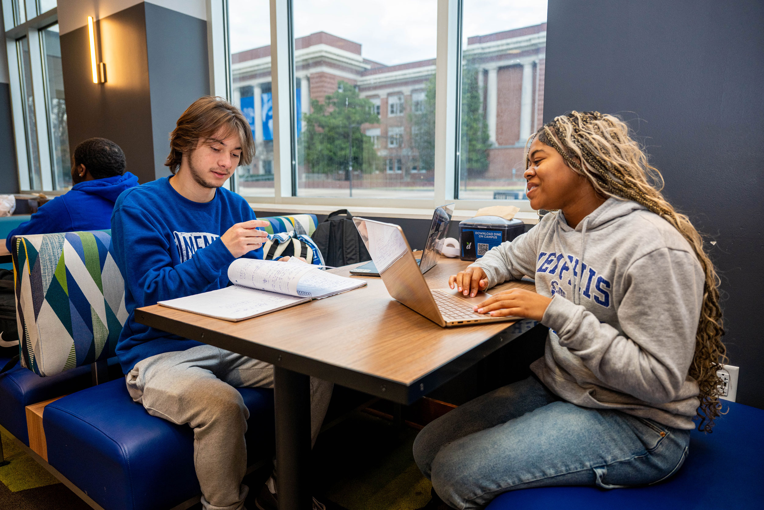 Two students studying at Toms on campus